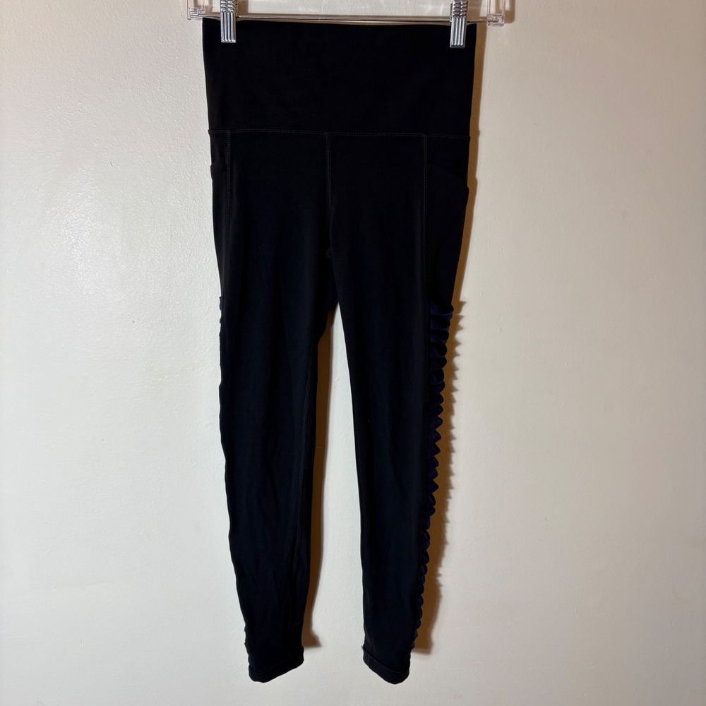 Athleta Salutation 7/8 Tight Black Ruffle Side Pocket Leggings XS‎
